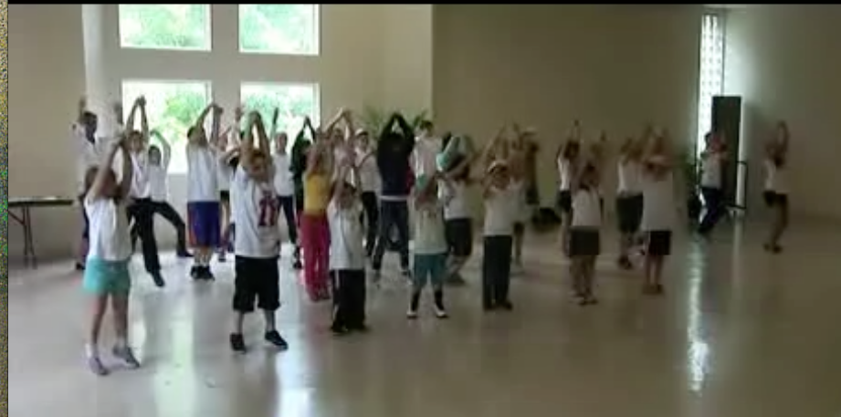 indoor dance performance of Hebrew School Kids